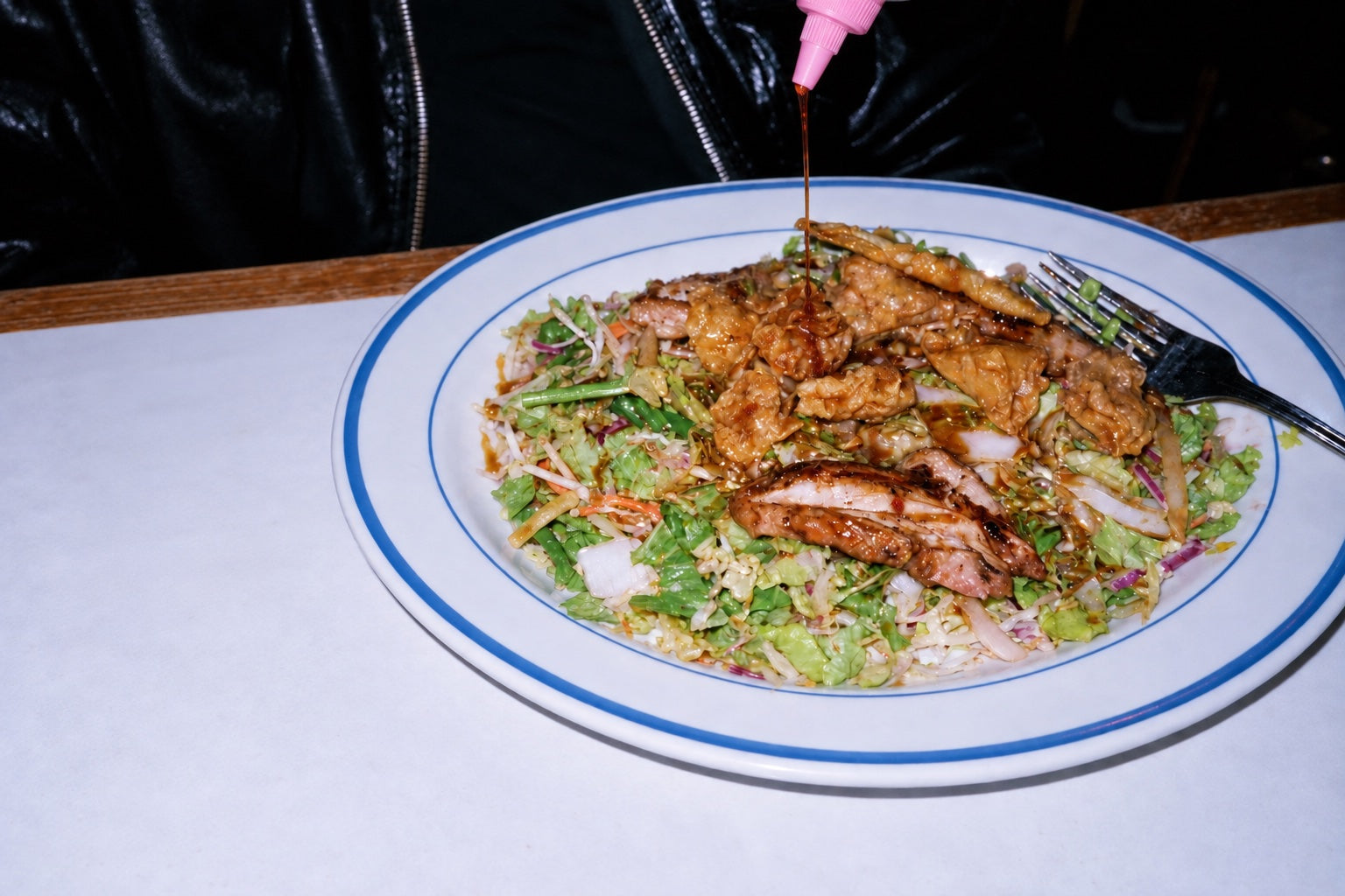 A fine drizzle of DOJO soy sauce over an everyday meal