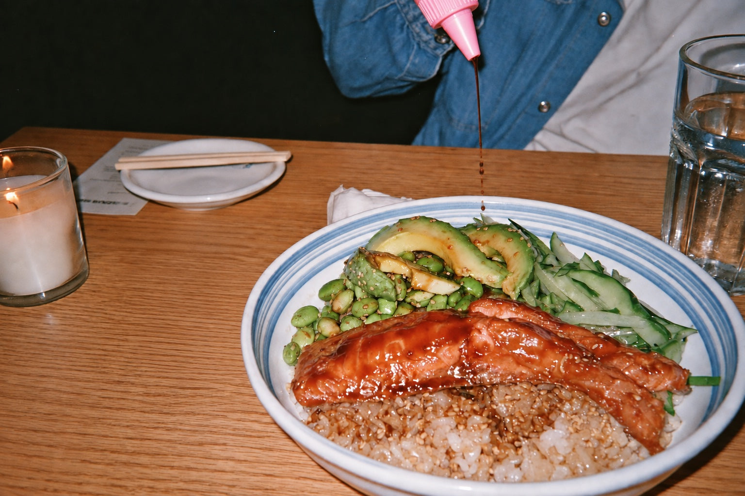 A fine drizzle of DOJO soy sauce over an everyday meal