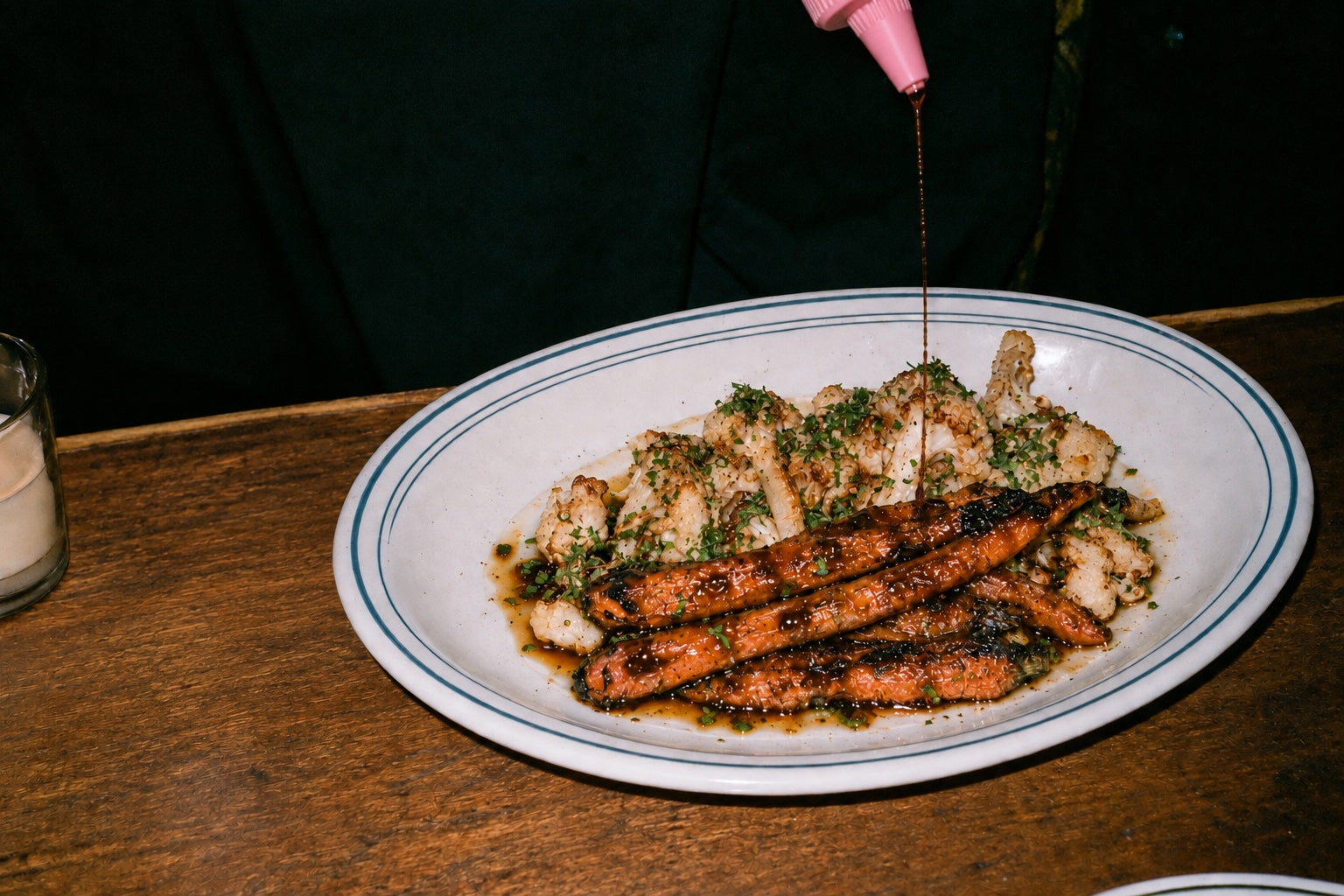 A fine drizzle of DOJO soy sauce over an everyday meal